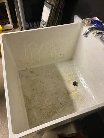 grimy white sink basin 