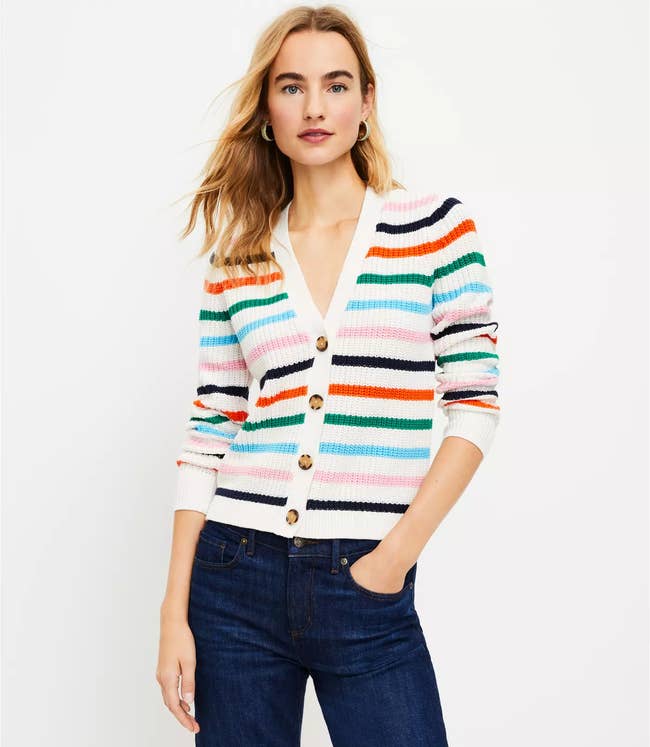 model in white and colorful stripe cardi