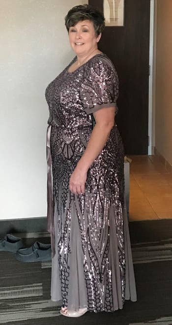 Image of reviewer wearing purple sequin dress