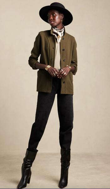 model wearing green chore jacket