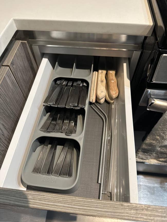 A reviewers drawer with their utensils placed neatly in the organizer 