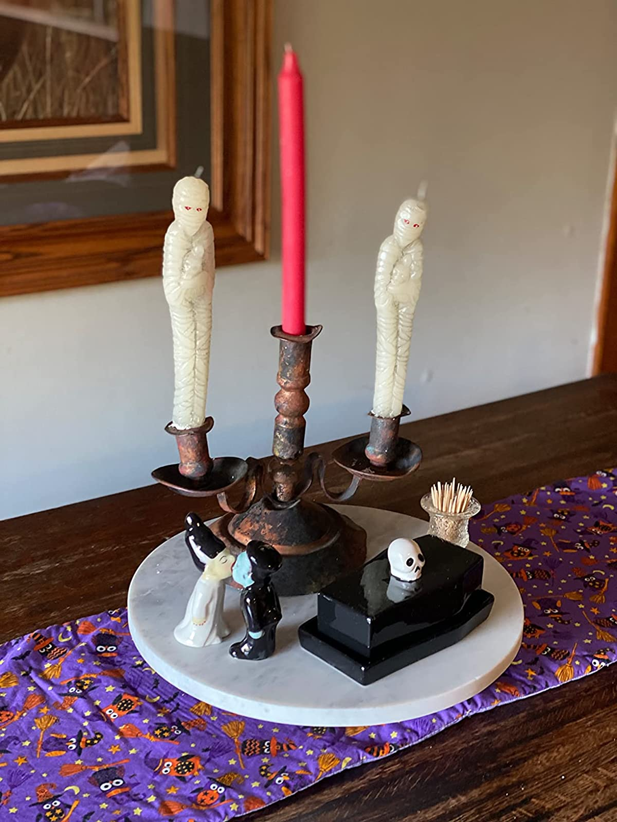 the frankenstein monster and bride brackish  and capsicum  shakers connected  a reviewer's eating  array  centerpiece display