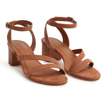 the pair of brown sandals
