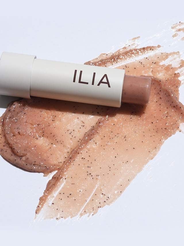 tube of the creamy product with exfoliating beads