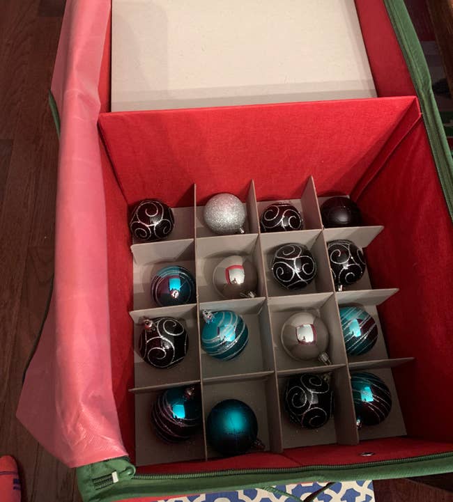 a reviewer photo of ornaments inside of the organizer