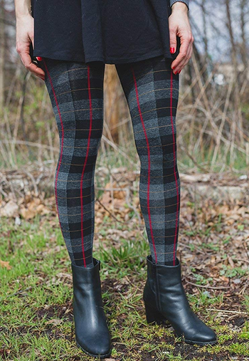Image of model wearing black plaid tights