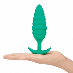 Large green butt plug with ribbed tapered texture