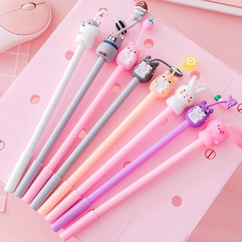animal pens with antennae like attachments shaped like candy, fruit, and mushrooms