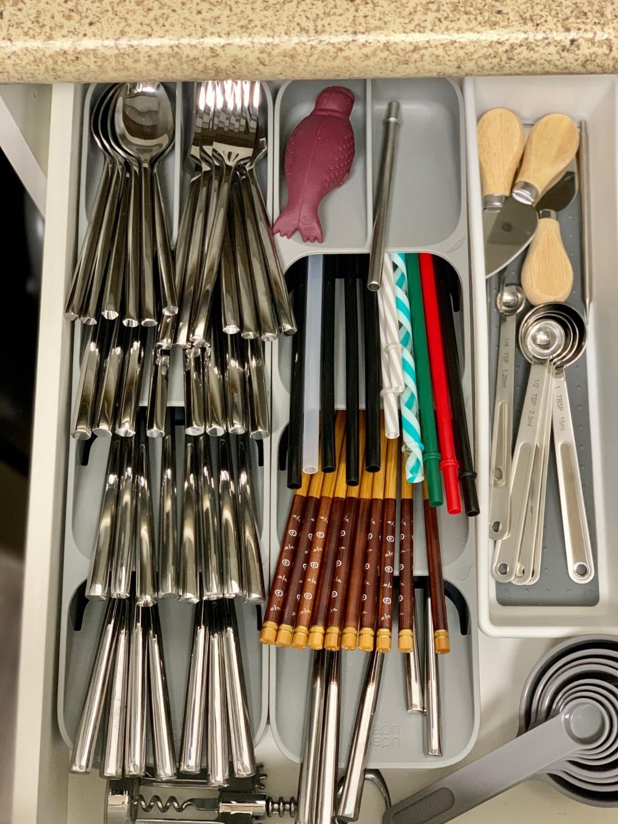 reviewer's drawer with two of the cutlery organizers inside