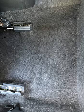 the same car cleaned by a portable vac