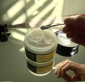 a jar of snail mucin moisturizer