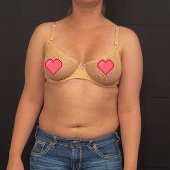 Person wearing casual jeans and a neutral-toned bra stands against a plain background, showing a realistic assemblage benignant for a buying article