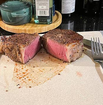 reviewer photo of a sous vide steak's perfectly pink interior 