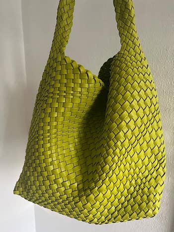 green woven tote bag