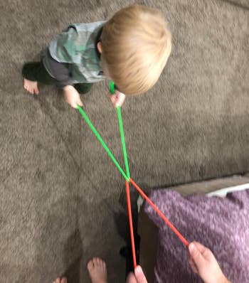 Reviewer image of child playing with the fidget toys