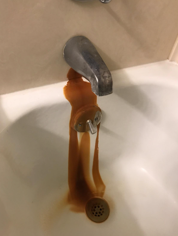 rust from leaky bathtub faucet 