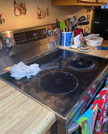 a dirty glass cooktop