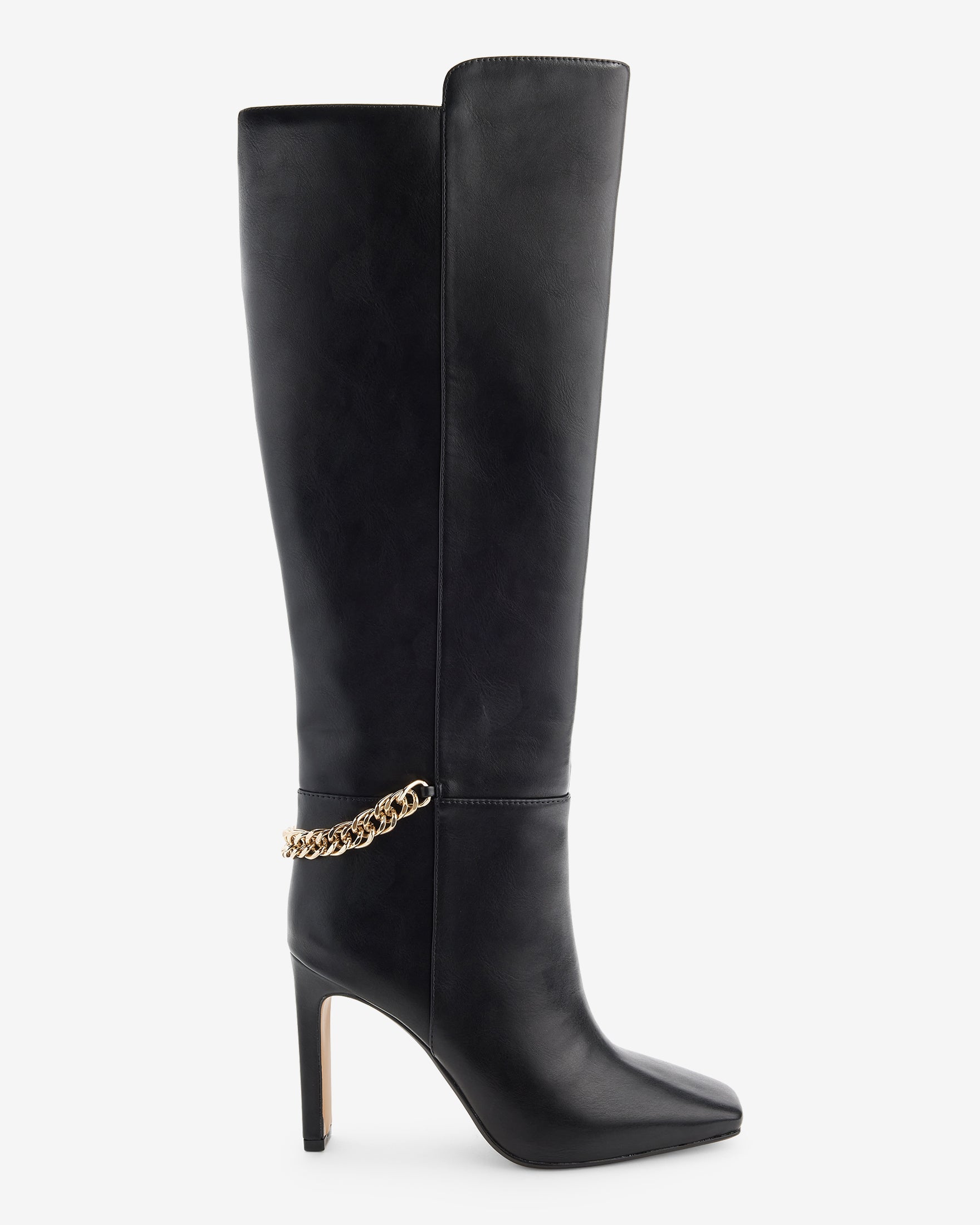Tall black leather boots with thin gold chain covering back ankle area