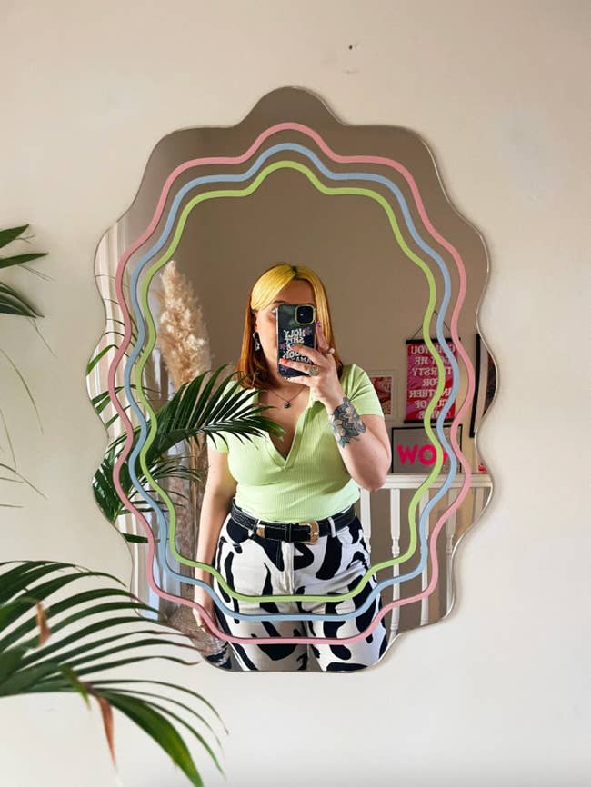 Etsy shop owner taking a selfie in the mirror