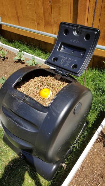 the composter used to make dirt and filled with food scraps