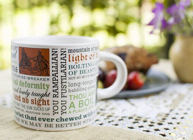 the Shakespearian insult mug on a table