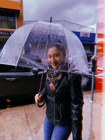 a reviewer in a clear bubble umbrella