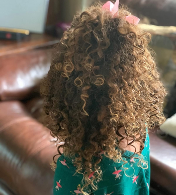 image of reviewer's child's curly hair