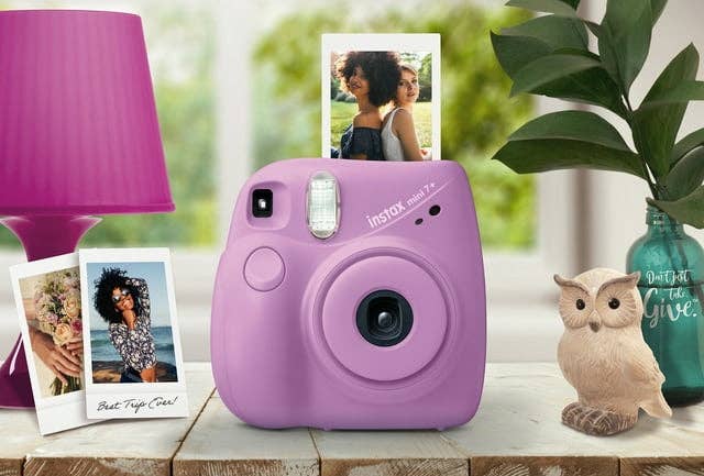 a purple instax camera