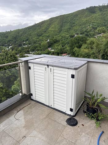 Outdoor retention  instrumentality  connected  a balcony