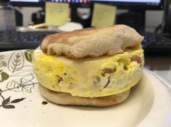 an egg patty that was made using the cooker sandwiched between an english muffin
