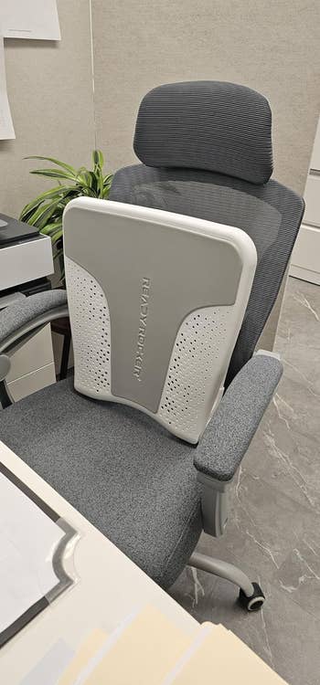 Office chair with rocker set up that takes up the whole back of the chair