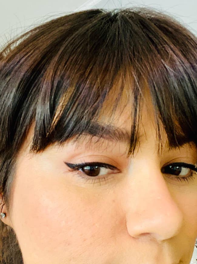 close up of reviewers perfectly winged liner