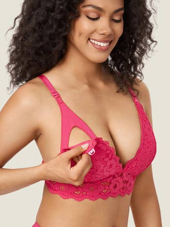 a close up of the nursing bra in hot pink