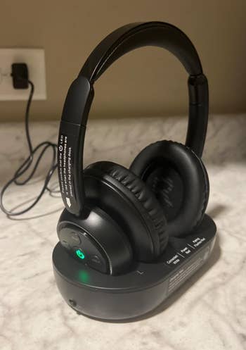 Headphones connected a charging dock