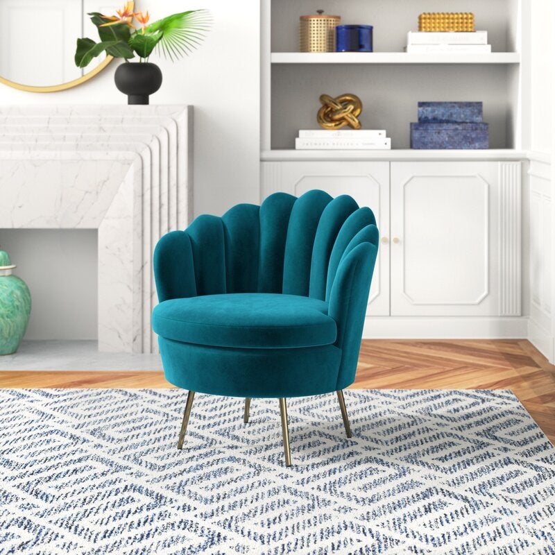 A blue chair with gold legs