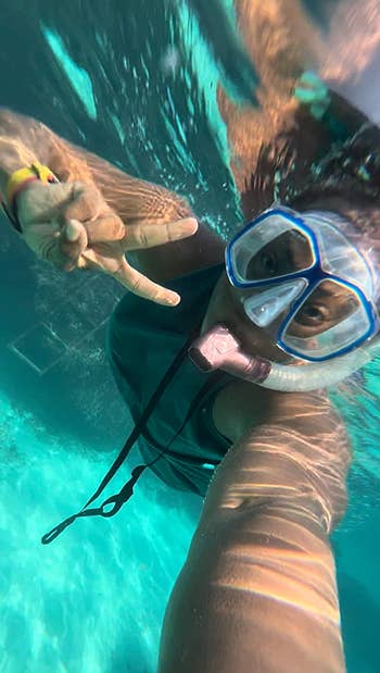 a reviewer takes a photo underwater