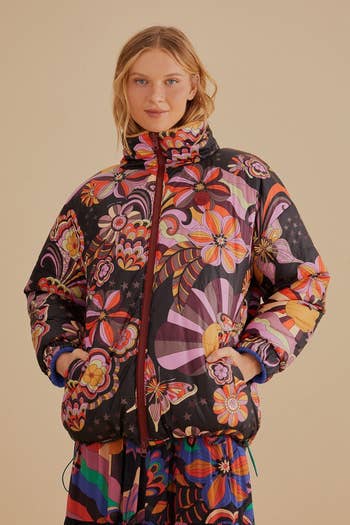 puffer jacket with a colorful floral pattern on it
