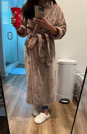 another reviewer wearing the mauve robe