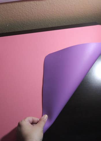 another reviewer showing the double-sided feature of a purple and pink office pad