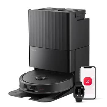 Robot vacuum and mop with dock, shown adjacent  to smartphone and smartwatch displaying its app interface. Suitable for automated cleaning