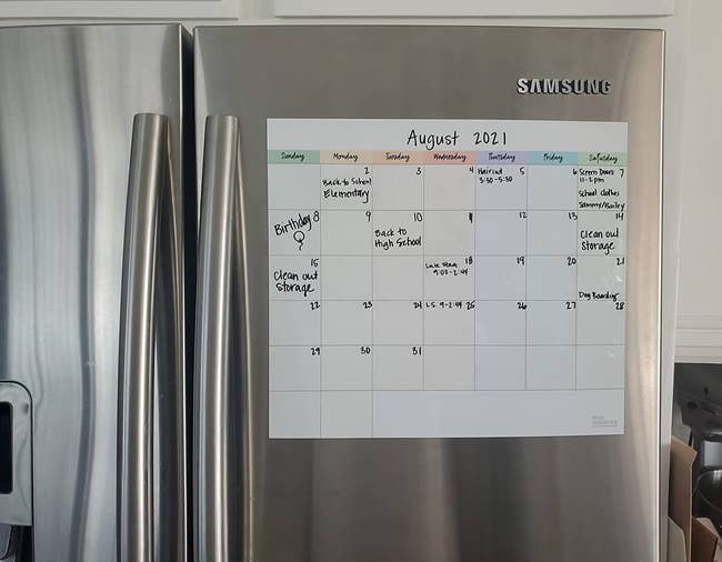 reviewer photo showing the calendar on their fridge 