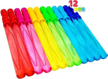 a rainbow of long bubble wands