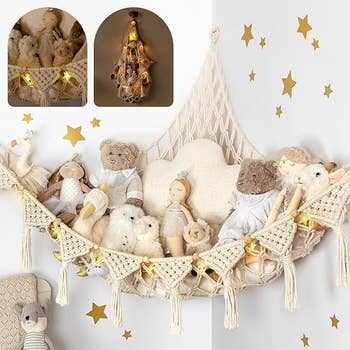 Cream macrame hammock with stuffed animals and surrounded by golden  stars connected  the partition  and prima  shaped lights 