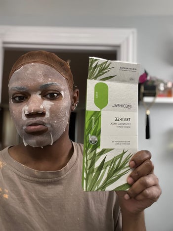 a reviewer with a face mask on