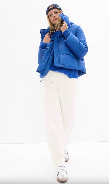 model wearing the coat in blue