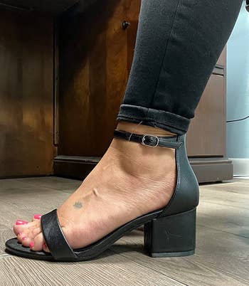 image of reviewer wearing the black sandal