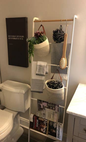 A reviewer shows the ladder successful  their bathroom