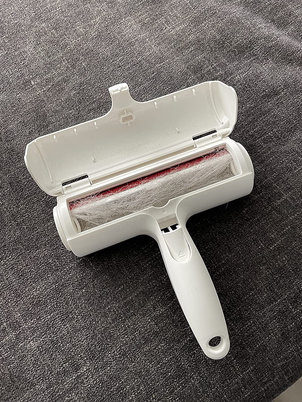 reviewer's pet hair remover filled with hair