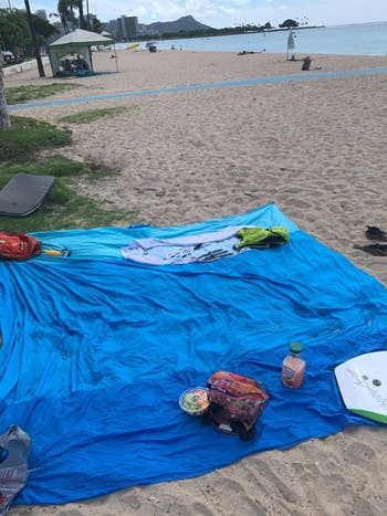 reviewer image of the beach towel spread out at the beach