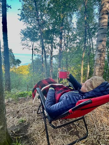 Reviewer enjoys the lounge chair outside